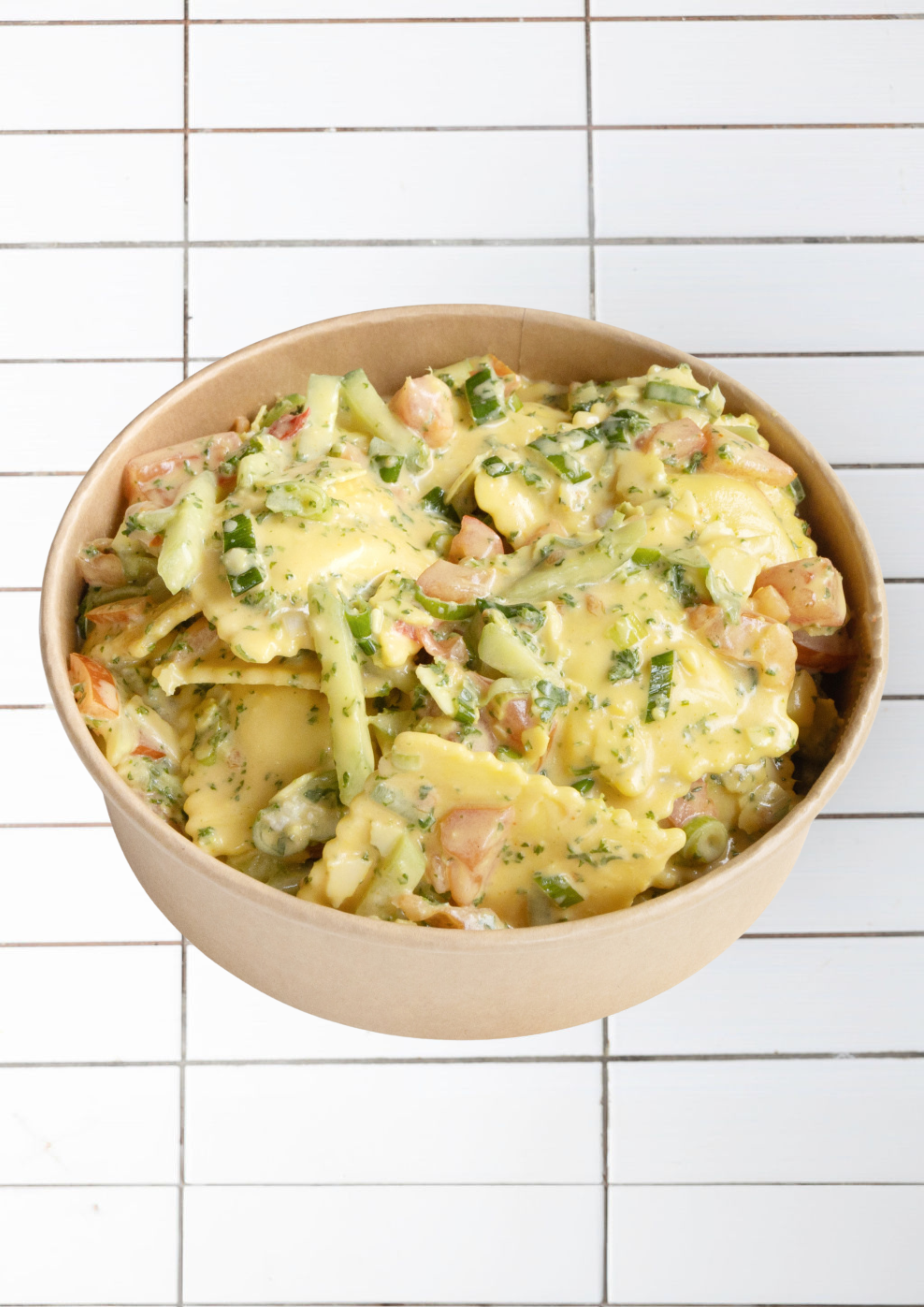 Ravioles de chèvre vinaigrette du jour.